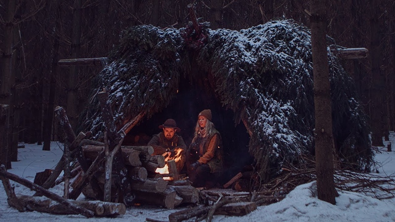 Winter Camping in Bushcraft Shelter Spruce Bough Bed, Long Log Fire, Camp